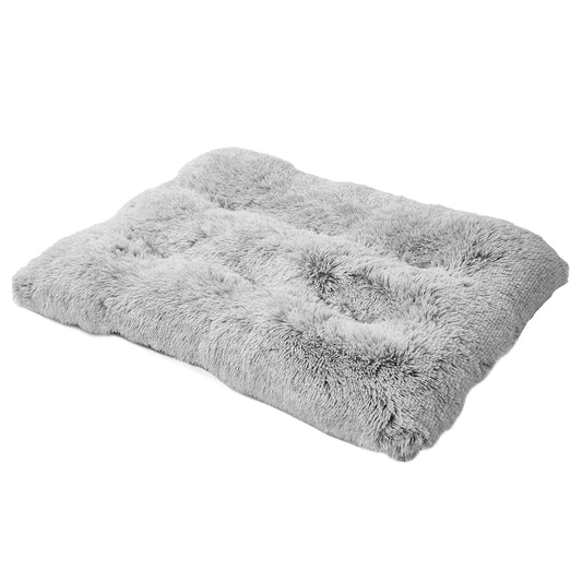 Soft gray plush dog bed with a comfortable cushioned surface