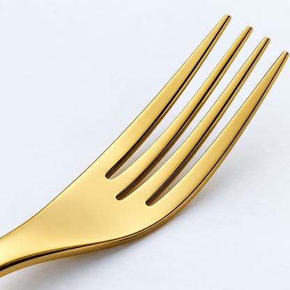 Close-up of gold stainless steel dining fork