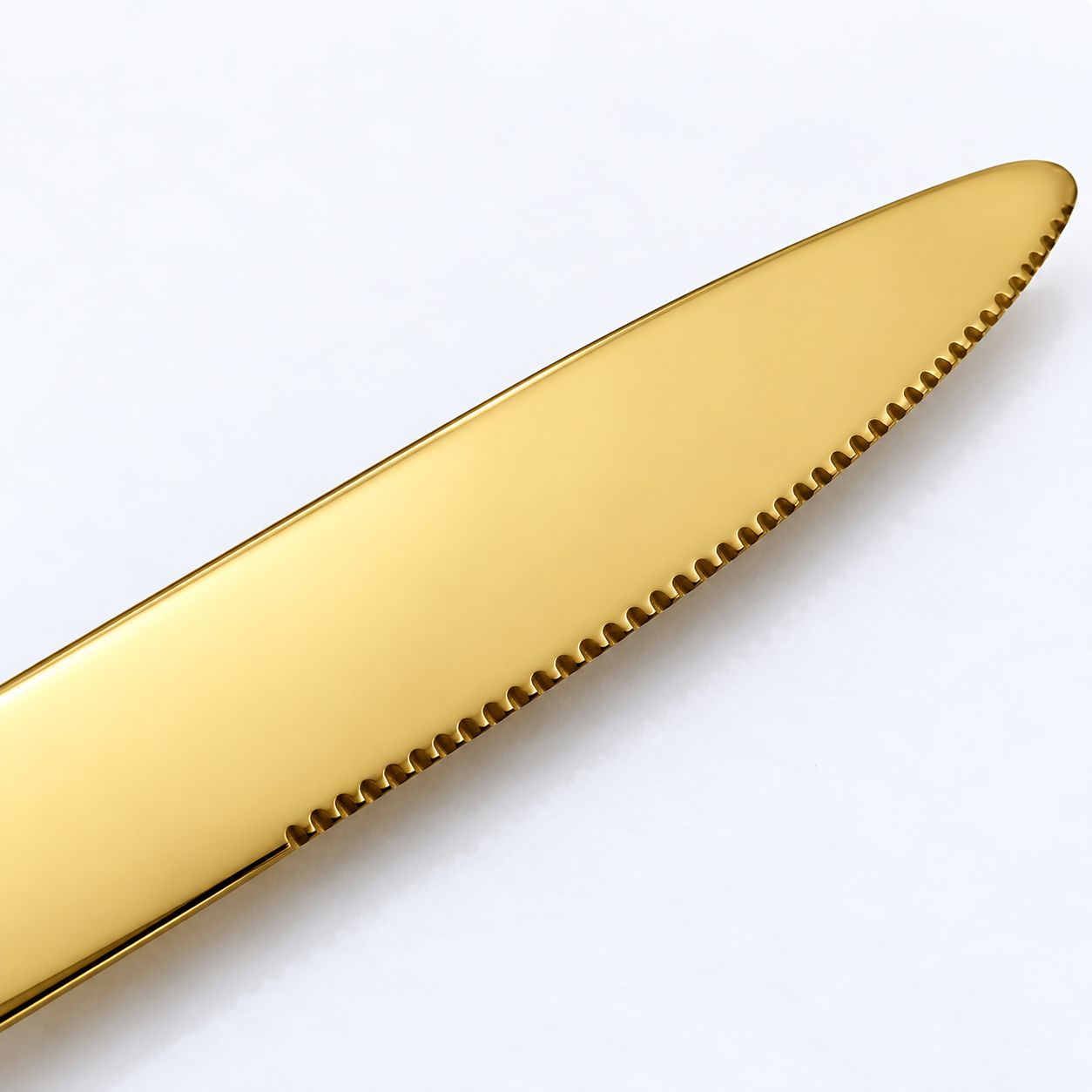 Close-up of gold stainless steel table knife