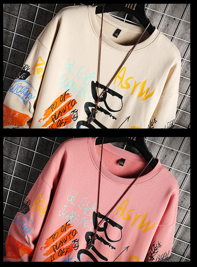 White and pink oversized graffiti print sweatshirts shown in different color options