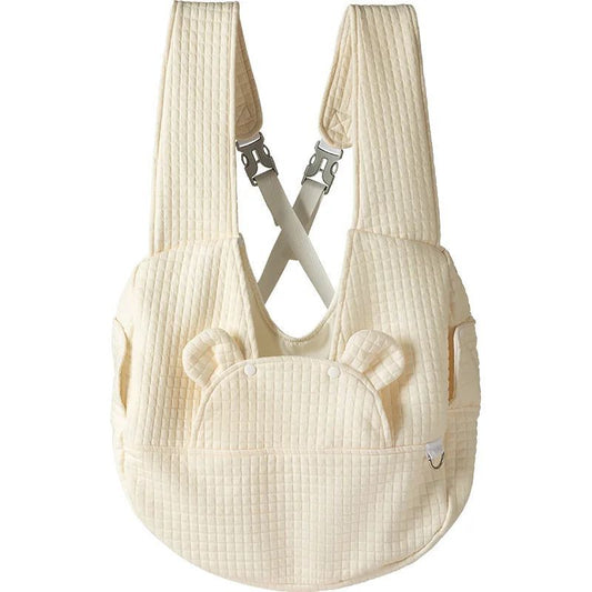 Beige small dog carrier backpack with cross-back straps