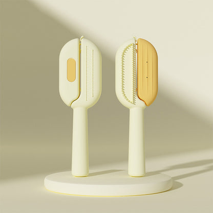 Yellow self-cleaning pet brush with grooming bristles