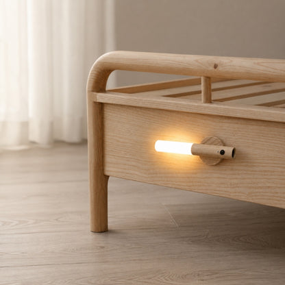 Motion Sensor Night Light providing soft warm lighting beside a bed