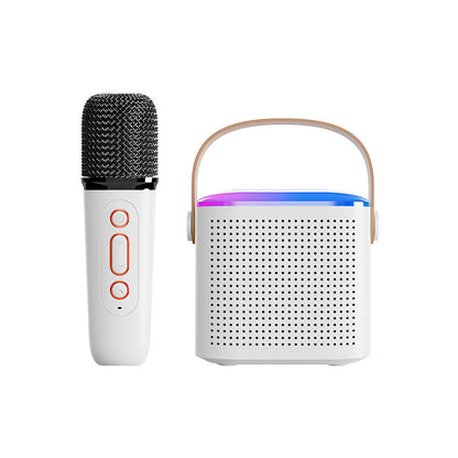 Compact karaoke machine with dual wireless microphones and colorful RGB lighting