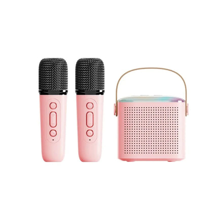 Portable karaoke machine with dual wireless microphones and pink RGB lighting