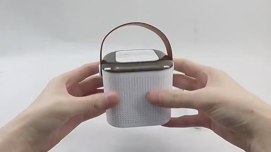 Product demonstration of the portable karaoke machine with wireless microphones