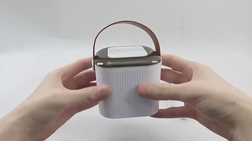 Product demonstration of the portable karaoke machine with wireless microphones