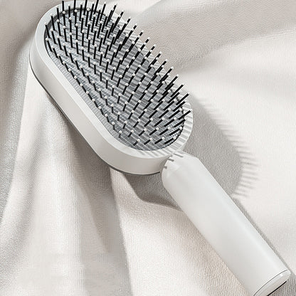 Hair brush with flexible bristles for gentle scalp massage