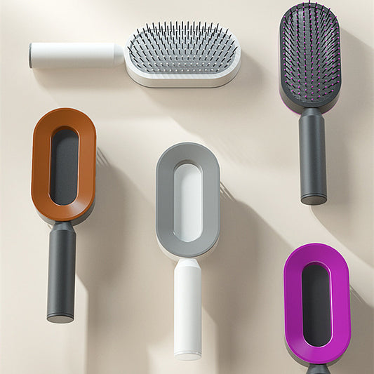 Self-cleaning hair brush with flexible scalp massage bristles